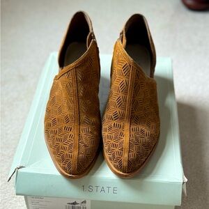 1. State perforated suede cutaway booties